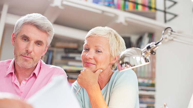 Two business owners preparing for the insurance audit.